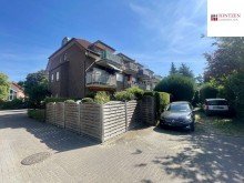 R�ckansicht mit Balkonen und G�rten Vermietete Dachgeschosswohung mit Balkon und Stellplatz in zentraler Lage von Grevenbroich / Elsen